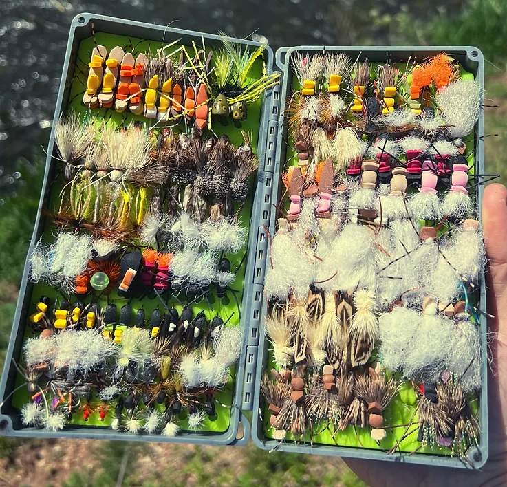 Fly box full of terrestrials and hoppers for late summer